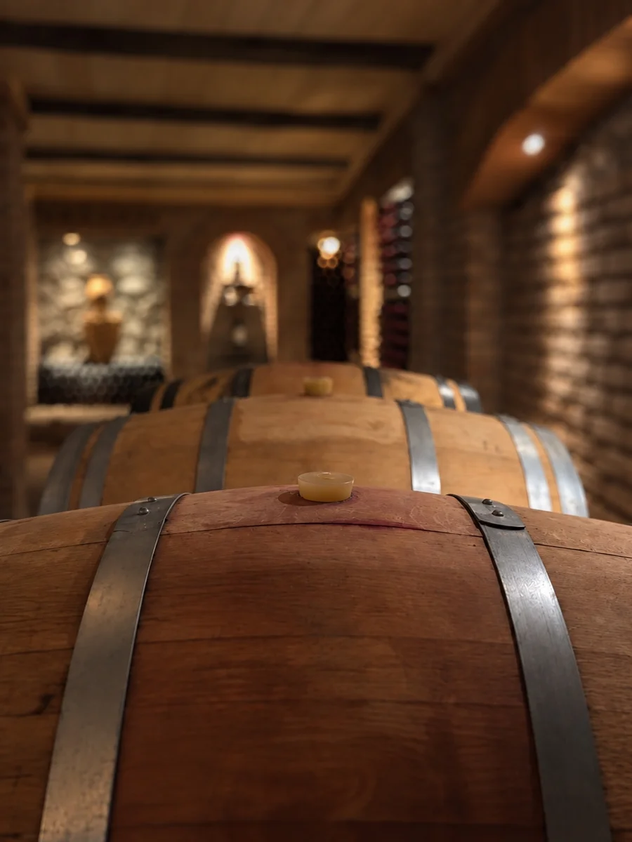 French oak barrels resting in Maiseli’s cellar